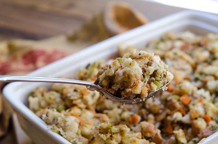 A spoonful of freshly baked classic bread stuffing.