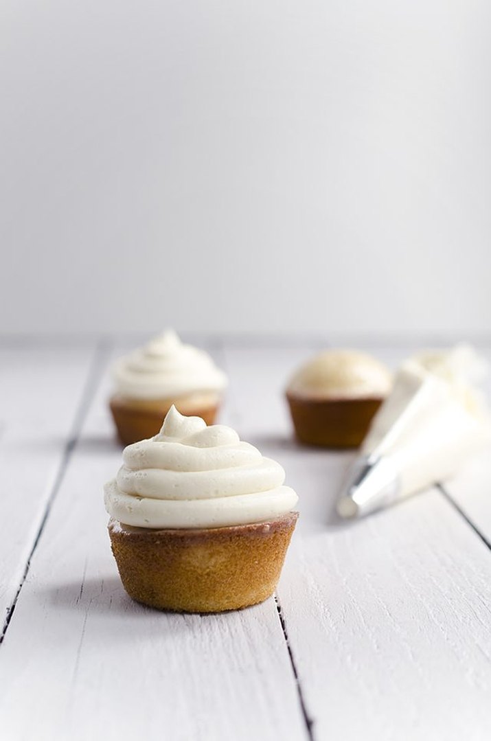 Three frosted Tres Leches cupcakes.