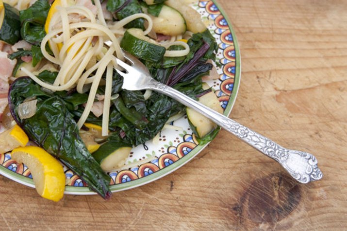 Linguine with sauteed Swiss chard, summer squash and bacon.