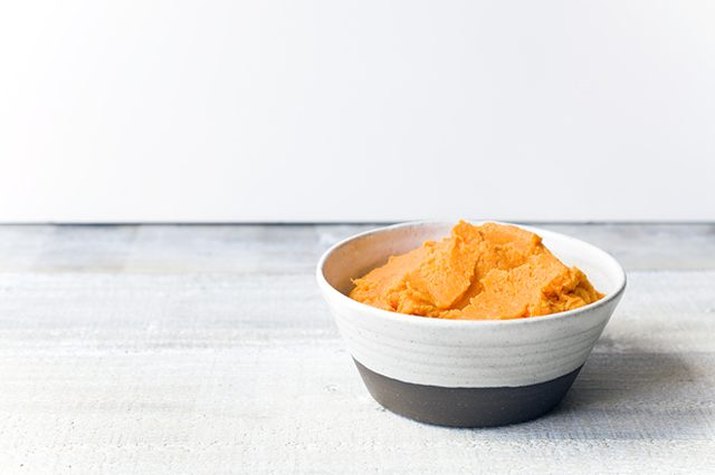 Bowl full of smooth and creamy brown butter mashed sweet potatoes.