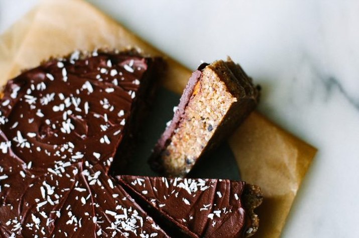 A slice of perfectly-browned no-bake chocolate coconut cake.