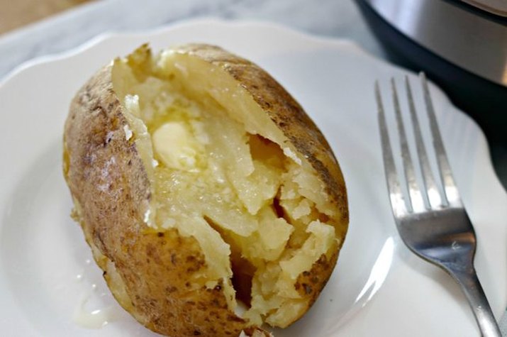 Baked potato with melted butter