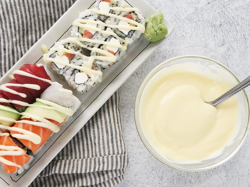 Japanese mayonnaise spread over sushi